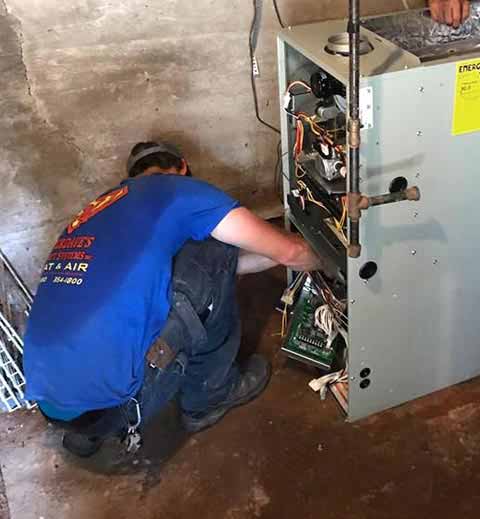 One of our AC repair techs hard at work on a customer's air conditioner.